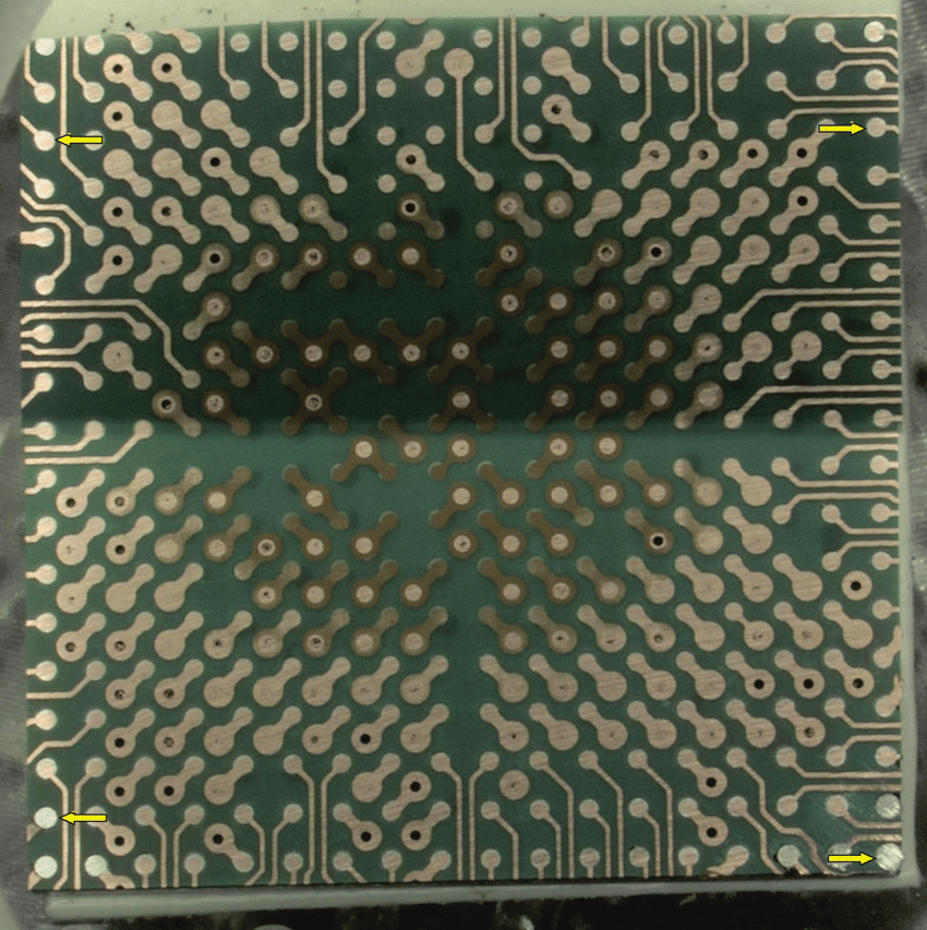 Removal of the body of the soldered BGA by polishing it down from the top of the BGA. Preparation by plane parallel grinding of the BGA shows some warpage in the soldered BGA. On the left, the PCB of the BGA has already been polished down to the silvery, shining top of the first balls. 